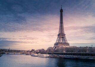 long distance shot of the Eiffel Tower in Paris France; skip tracing services in France concept