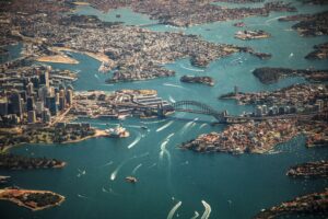 aerial view of Sydney Harbor in Australia; skip tracing services in Australia