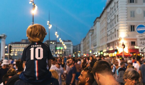 French people gathered in a public place; locate birth parents in France concept