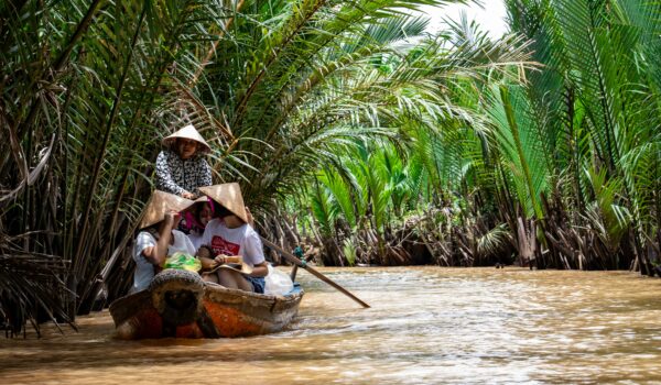 Vietnamese family on a canoe; locate birth parents in Vietnam