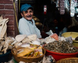 Honduran grandfather in his shop in Santa Rosa de Copán, Honduras; locate birth parents in Honduras concept