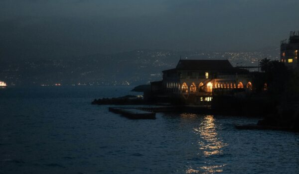 Beirut, Lebanon at night shot from the sea; skip tracing services in Lebanon concept