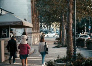 family walking in the streets of Luxembourg; locate birth family in Luxembourg concept