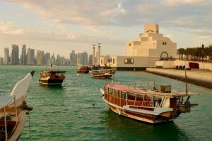 seascape with the Doha city in the background in Qatar; skip tracing services in Qatar concept