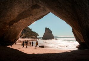 people visiting Te Whanganui-A-Hei Marine Reserve, New Zealand; locate birth parents in New Zealand concept