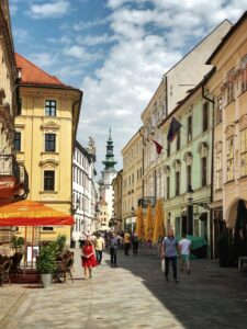 people walking in the streets of Bratislava, Slovakia; locate birth parents in Slovakia